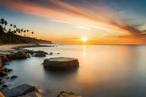 un' bellissimo tramonto al di sopra di il oceano con rocce e palma alberi. ai-generato foto