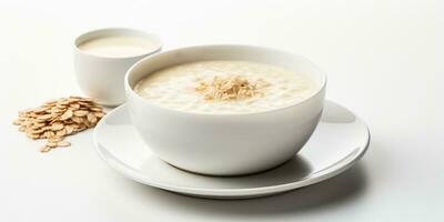 fiocchi d'avena porridge nel bianca ciotola. delizioso prima colazione nel il mattina. generativo ai foto