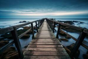 di legno ponte con il bellezza di il spiaggia, lungo esposizione. generativo ai foto