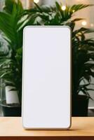 modello smartphone con vuoto schermo su tavolo con verde pianta ai generato foto