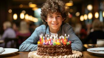 poco ragazzo soffiaggio su candele su il suo compleanno torta.. generativo ai foto