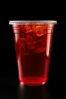 rosso bevanda nel un' plastica tazza isolato su un' nero sfondo. prendere lontano bevande concetto. ai generato foto