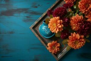 un' blu di legno tavola con fiori su esso foto