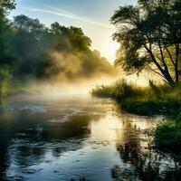 un' calmante mattina nebbia crescente al di sopra di un' tranquillo fiume foto