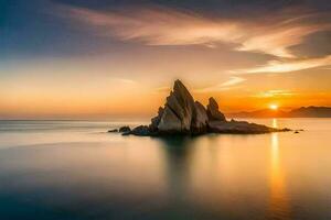 il tramonto al di sopra di il oceano con rocce nel il primo piano. ai-generato foto