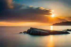 un' tramonto al di sopra di il oceano con rocce e acqua. ai-generato foto