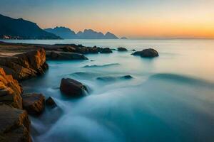 un' lungo esposizione fotografia di onde Crashing contro rocce a tramonto. ai-generato foto