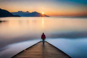 un' uomo in piedi su un' molo guardare a il sole ambientazione al di sopra di il acqua. ai-generato foto