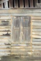 trama del muro di casa in legno vecchio stile asiatico. foto