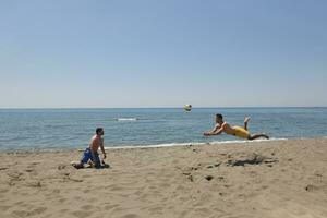 maschio spiaggia pallavolo gioco giocatore foto