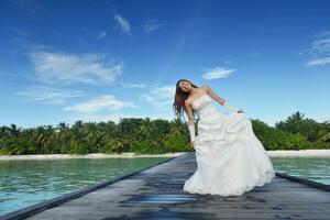 asiatico sposa su spiaggia foto