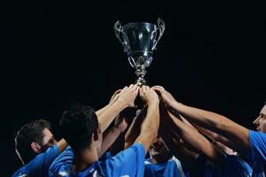 calciatori che celebrano la vittoria foto