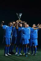 calciatori che celebrano la vittoria foto