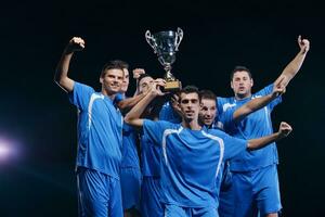 calciatori che celebrano la vittoria foto