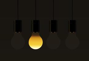 idea concetto lampadine su sfondo marrone