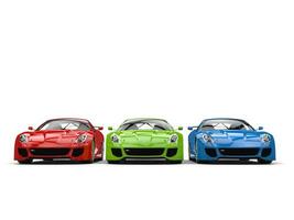veloce gli sport macchine nel rosso, verde e blu foto