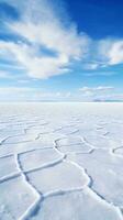 un' sereno inverno paesaggio con un' incontaminato coperta di bianca neve e un' chiaro blu cielo ai generato foto