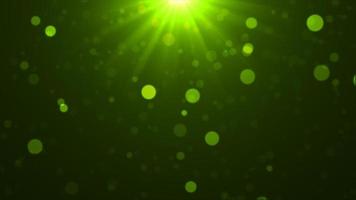 sfondo di particelle incandescenti che cadono verde