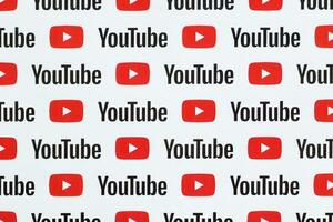 Youtube modello stampato su carta con piccolo Youtube loghi e iscrizioni. Youtube è Google filiale e americano maggior parte popolare condivisione video piattaforma foto