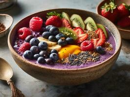 un' rinfrescante, pieno di frutta frullato ciotola, traboccante con un Vettore di colorato frutti di bosco, Banana fette, e chia semi. foto