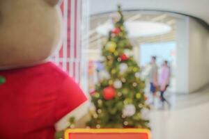 astratto sfocato Natale albero con bokeh leggero sfondo foto