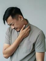 asiatico uomo con dolore su neutro sfondo ai generativo foto