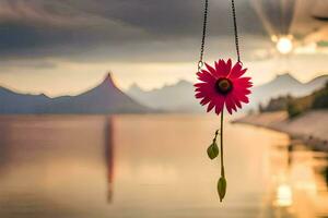 un' rosa fiore si blocca a partire dal un' collana al di sopra di un' lago. ai-generato foto