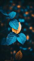 blu e arancia le foglie su un' buio sfondo generativo ai foto