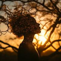 silhouette di un' donna con le foglie su sua testa a tramonto generativo ai foto