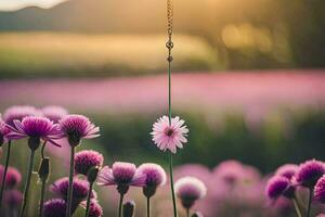 un' fiore sospeso a partire dal un' catena nel un' campo. ai-generato foto