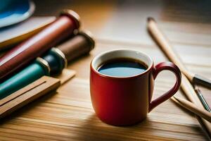 un' rosso tazza di caffè si siede su un' tavolo con un' matita, un' spazzola e un' pennello. ai-generato foto