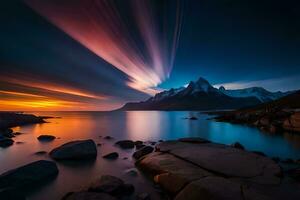 un' lungo esposizione fotografia di un' montagna gamma e acqua a tramonto. ai-generato foto