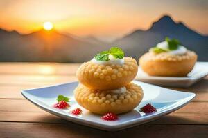 Due piccolo dolci su un' piatto con un' montagna nel il sfondo. ai-generato foto