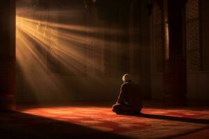 musulmano uomo preghiere nel il moschea con raggi di leggero In arrivo attraverso il finestra ai generativo foto