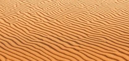 sabbia sfondo panorama di il deserto rughe di sabbia soffiato di il vento foto