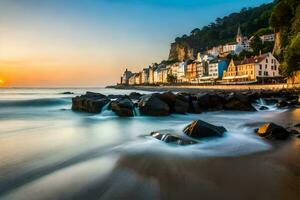 il spiaggia a tramonto con rocce e edifici. ai-generato foto