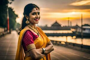 un' donna nel un' giallo sari pose per un' foto. ai-generato foto