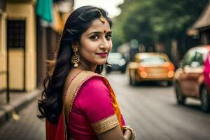 un' bellissimo donna nel un' rosa sari in piedi su un' strada. ai-generato foto