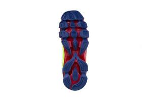 blu rosso gomma da cancellare suola con scarpe da ginnastica su un' bianca sfondo. foto