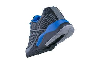 scarpe da ginnastica nero e blu. sport scarpe su bianca sfondo foto