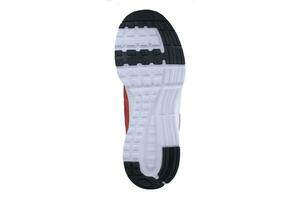 bianco-grigio gomma da cancellare suola con scarpe da ginnastica su un' bianca sfondo. foto