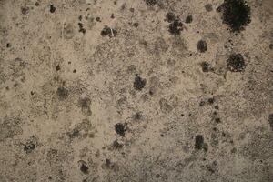 Esposto alle intemperie arrugginito sabbia parete sfondo, grungy parete superficie, anziano sabbia parete struttura foto