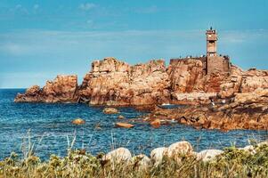 sereno faro su brehat isola, bretagna, Francia foto