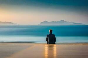 un' uomo seduta su il spiaggia a tramonto. ai-generato foto