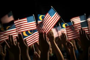 molti mani con americano bandiere su nero sfondo, avvicinamento. elezione concetto, mano agitando Malaysia bandiera anche conosciuto come jalur gemilang nel congiunzione, ai generato foto