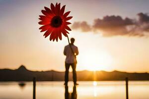 un' uomo Tenere un' rosso fiore nel davanti di il tramonto. ai-generato foto