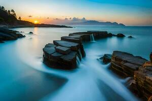 un' lungo esposizione fotografia di rocce nel il oceano a tramonto. ai-generato foto