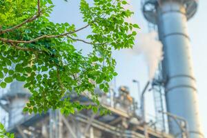 verde fabbrica industria per bene ambiente ozono aria Basso carbonio orma produzione concetto. foto