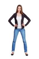 elegante ragazza snella in blue jeans foto