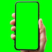 mano Spettacoli mobile smartphone con verde schermo nel verticale posizione isolato su verde sfondo. finto su mobile foto